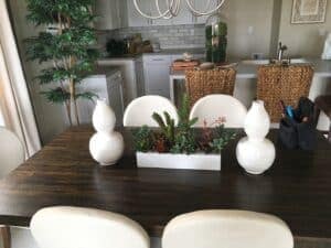 Pacific Silkscapes Table Centerpiece with Succulent in model home Pacific Silkscapes Table Centerpiece with Succulent in model home