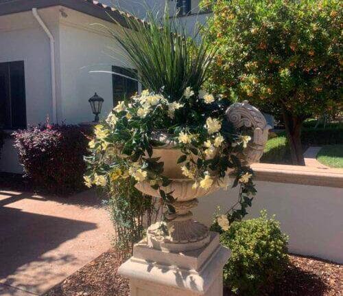 Outdoor faux grasses and White Impatients