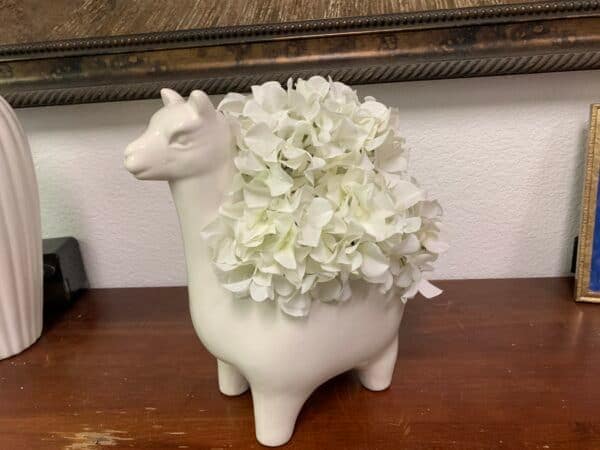 White Hydrangea in Llama arrangement Contact Pacific Silkscapes for a White Hydrangea in Llama silk flower arrangements