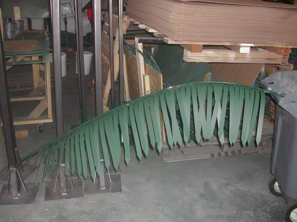 Artificial palm tree for outdoor decor and landscaping.