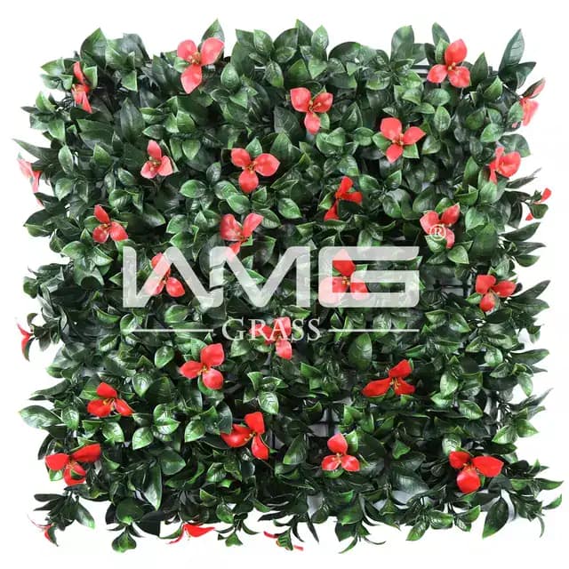Lush artificial green wall with red flowering accents from Pacific Silkscapes. Perfect for indoor or outdoor decor.