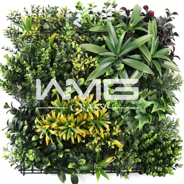 Vibrant green vertical garden featuring diverse indoor and outdoor plants for stylish decor.