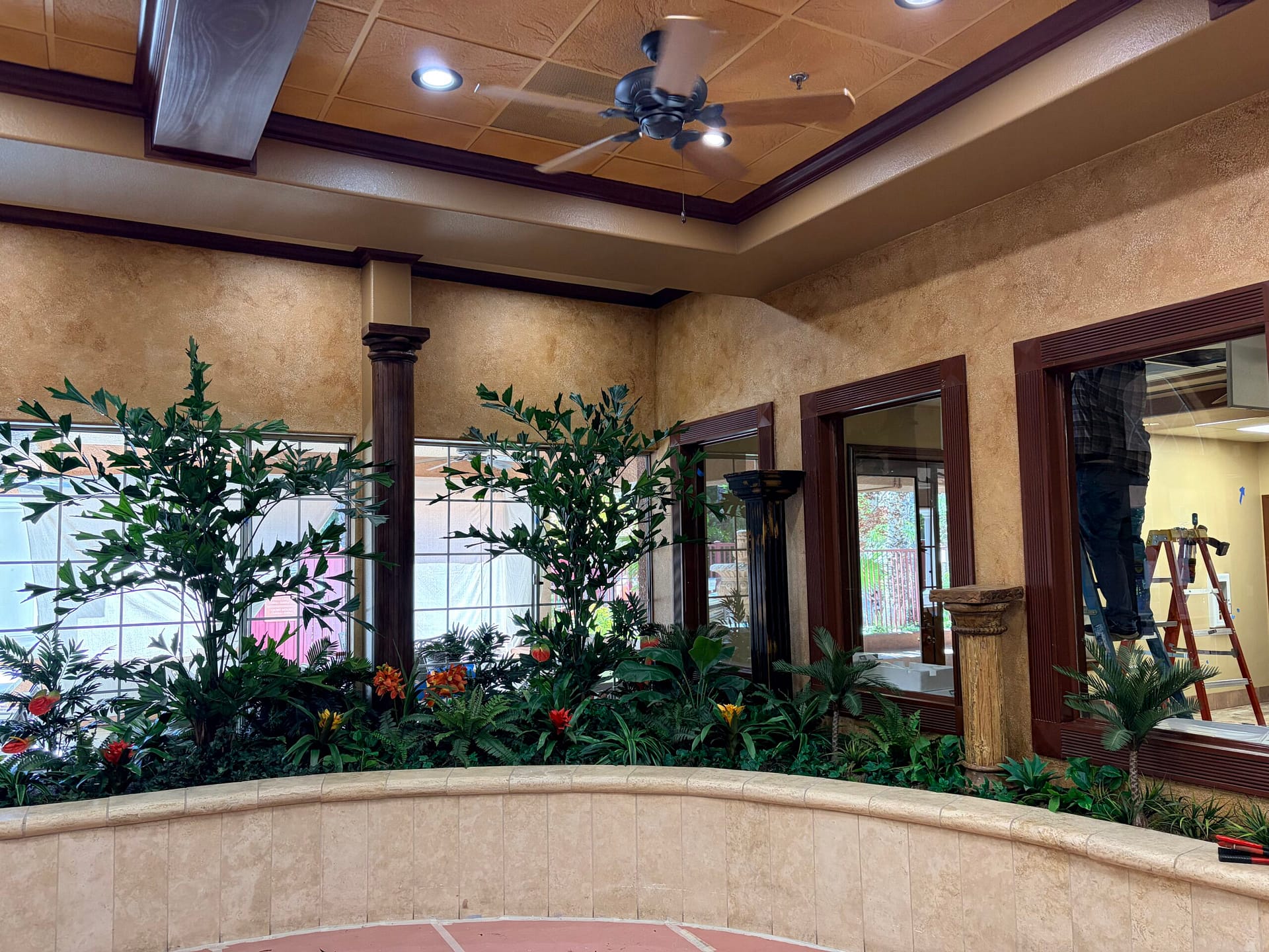 Artificial tropical plants in built-in planter box